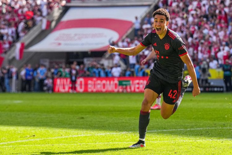 COLOGNE, GERMANY - MAY 27: Jamal Musiala of FC Bayern Munchen celebrating scoring late winner during the Bundesliga match between 1. FC Koln and FC Bayern Munchen at the RheinEnergieStadion on May 27, 2023 in Cologne, Germany (Photo by Rene Nijhuis/BSR Agency/Getty Images)